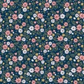 Simple cute pattern in small white and pink flowers on dark blue background.